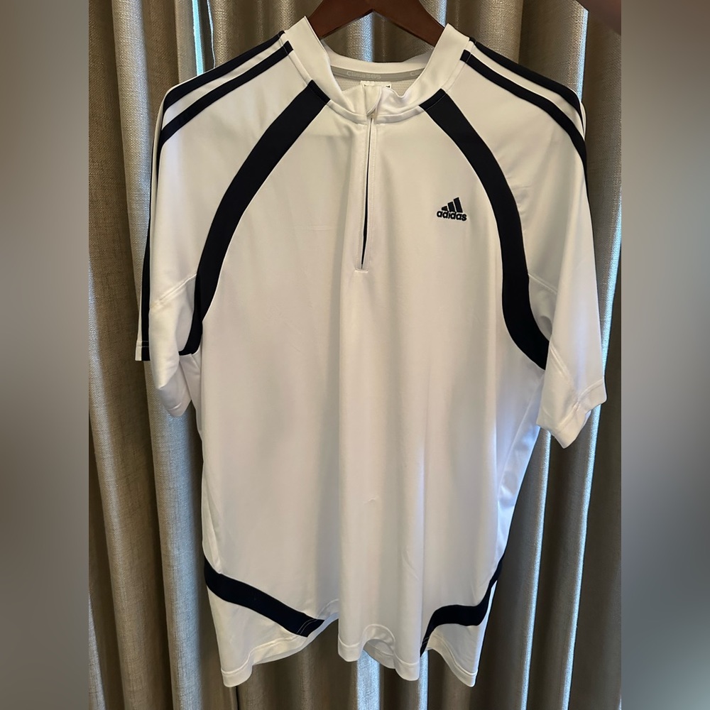 men’s adidas black and white polo shirt size XL.
